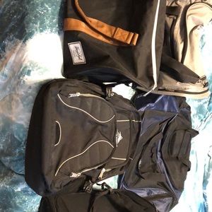 Assorted duffle bags